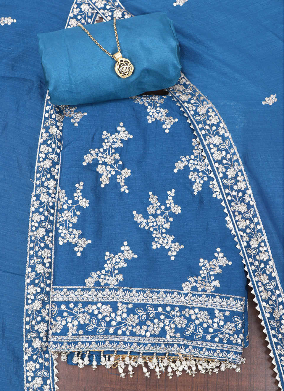 Embroidered unstitched dress outlet material