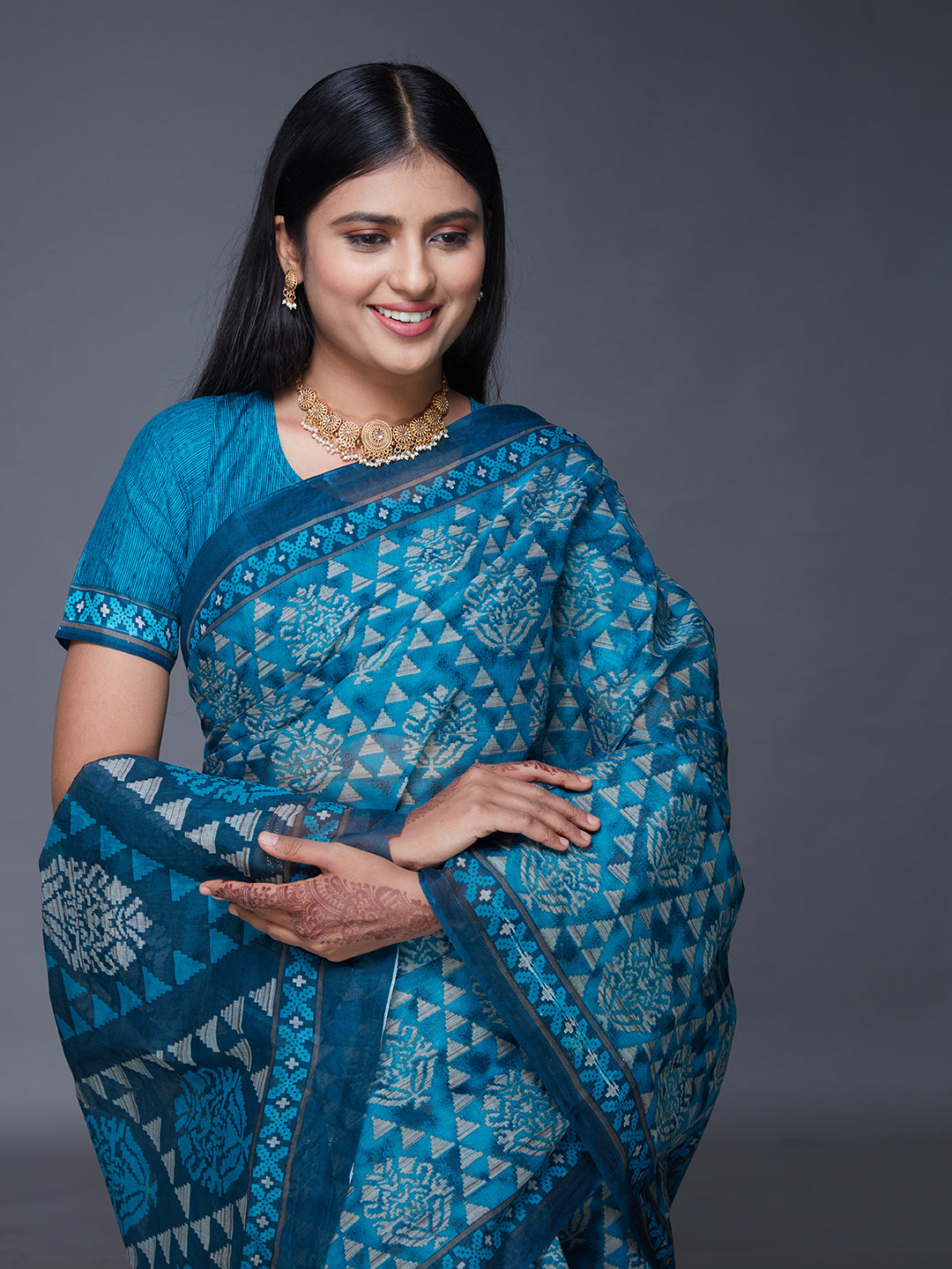 DIMPLE Teal Printed Pure Cotton Saree