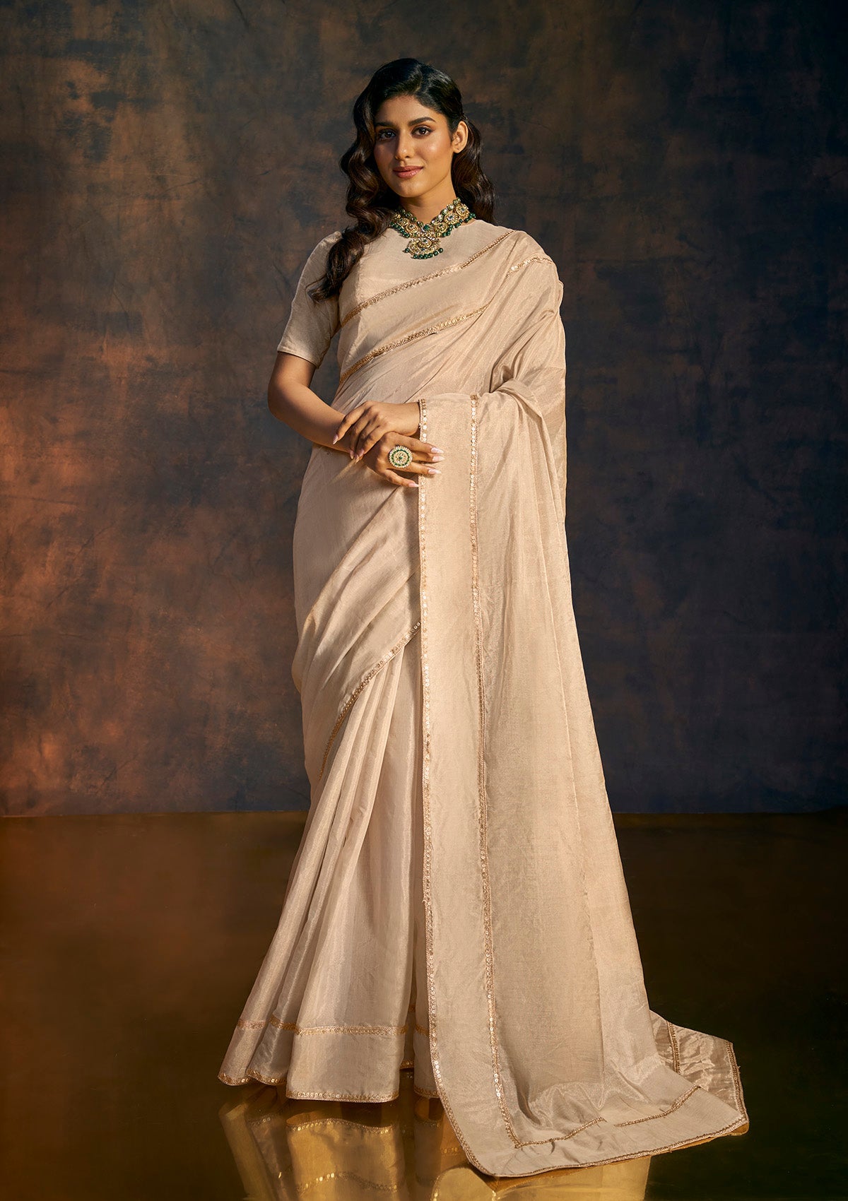 Beige embellished tissue saree