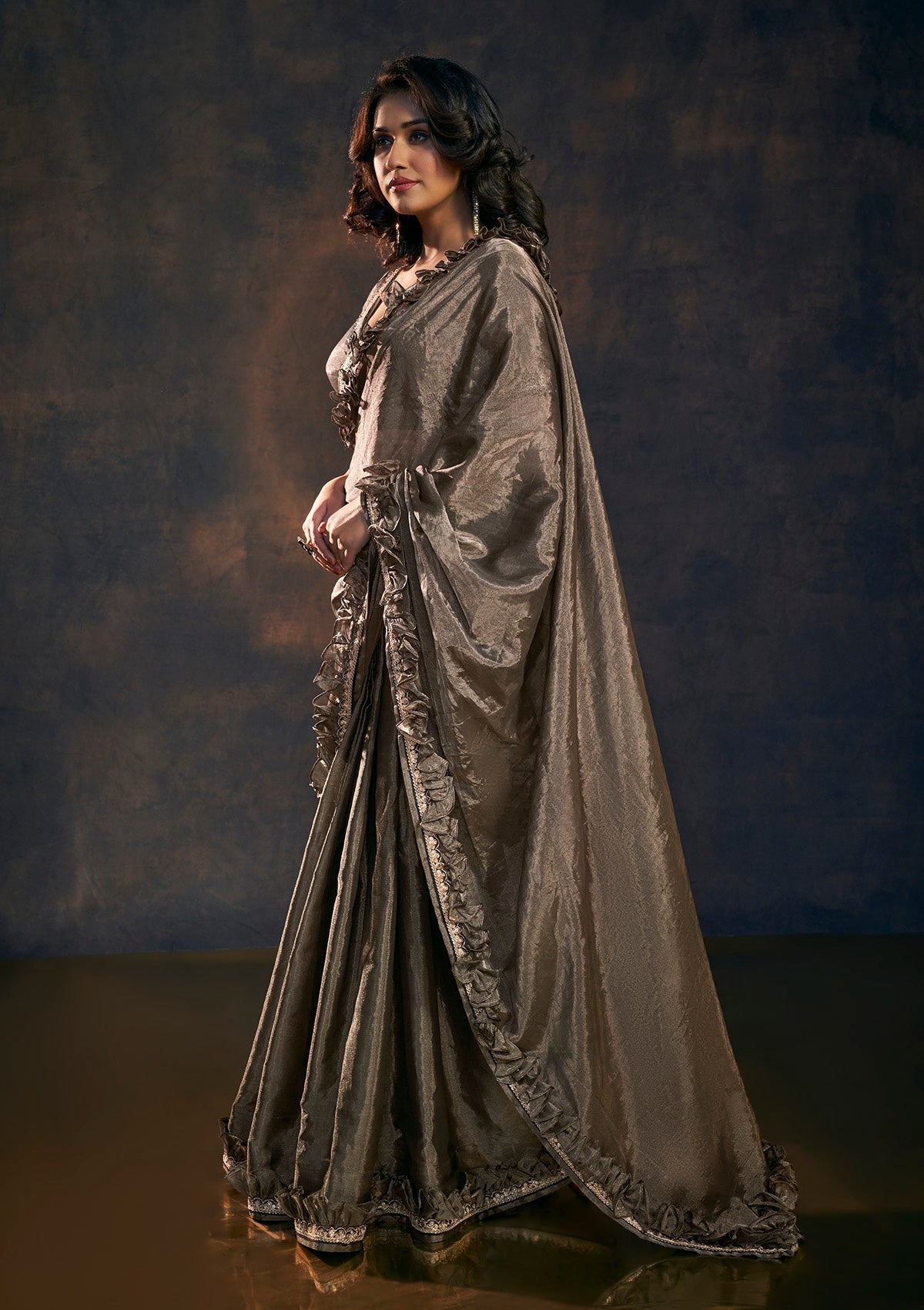 Black gold toned ruffle tissue saree