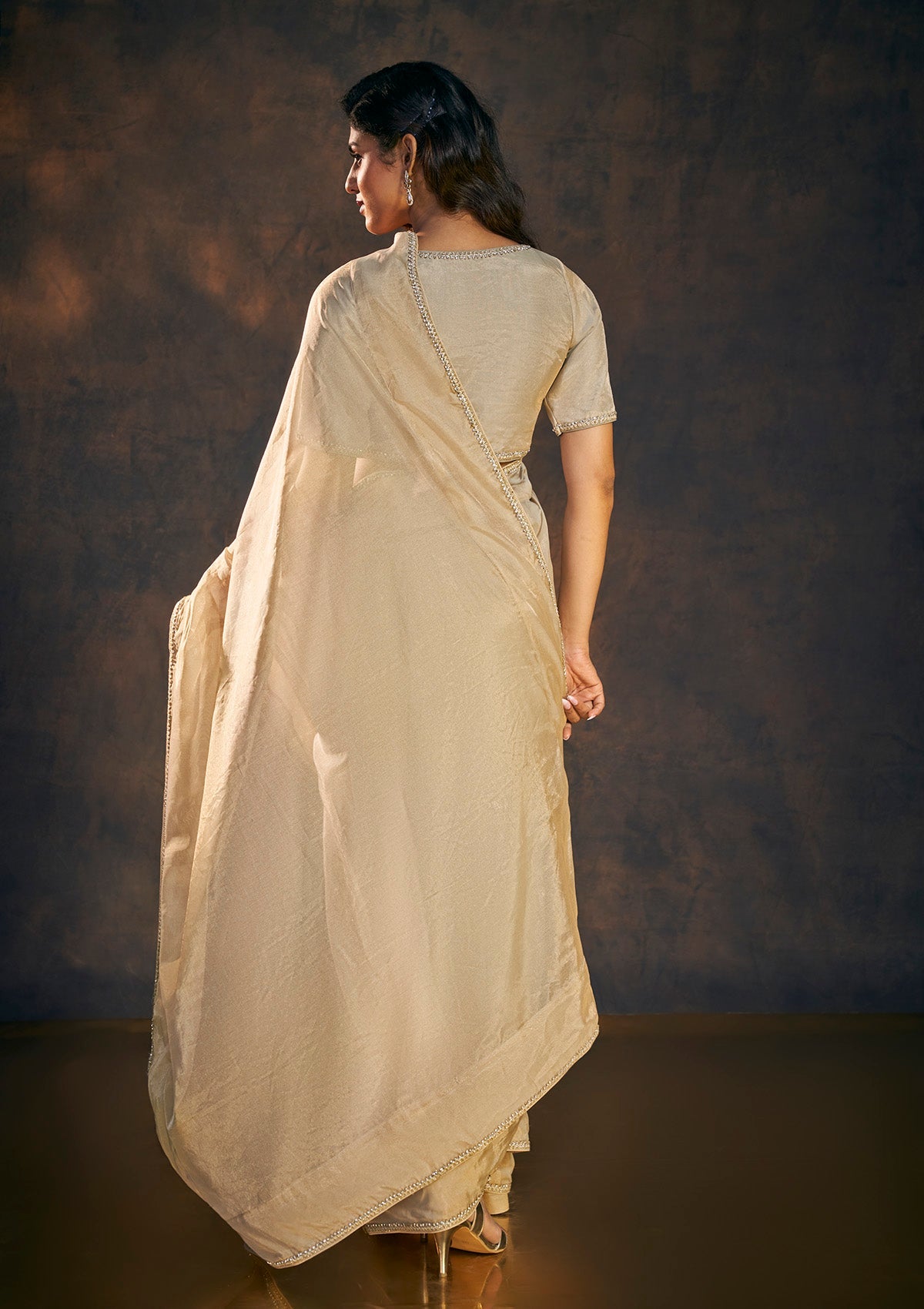 Beige embellished tissue saree