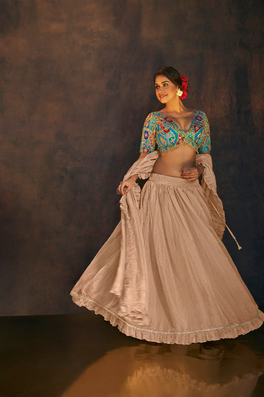 Beige Tissue silk ruffle lehenga with Dupatta