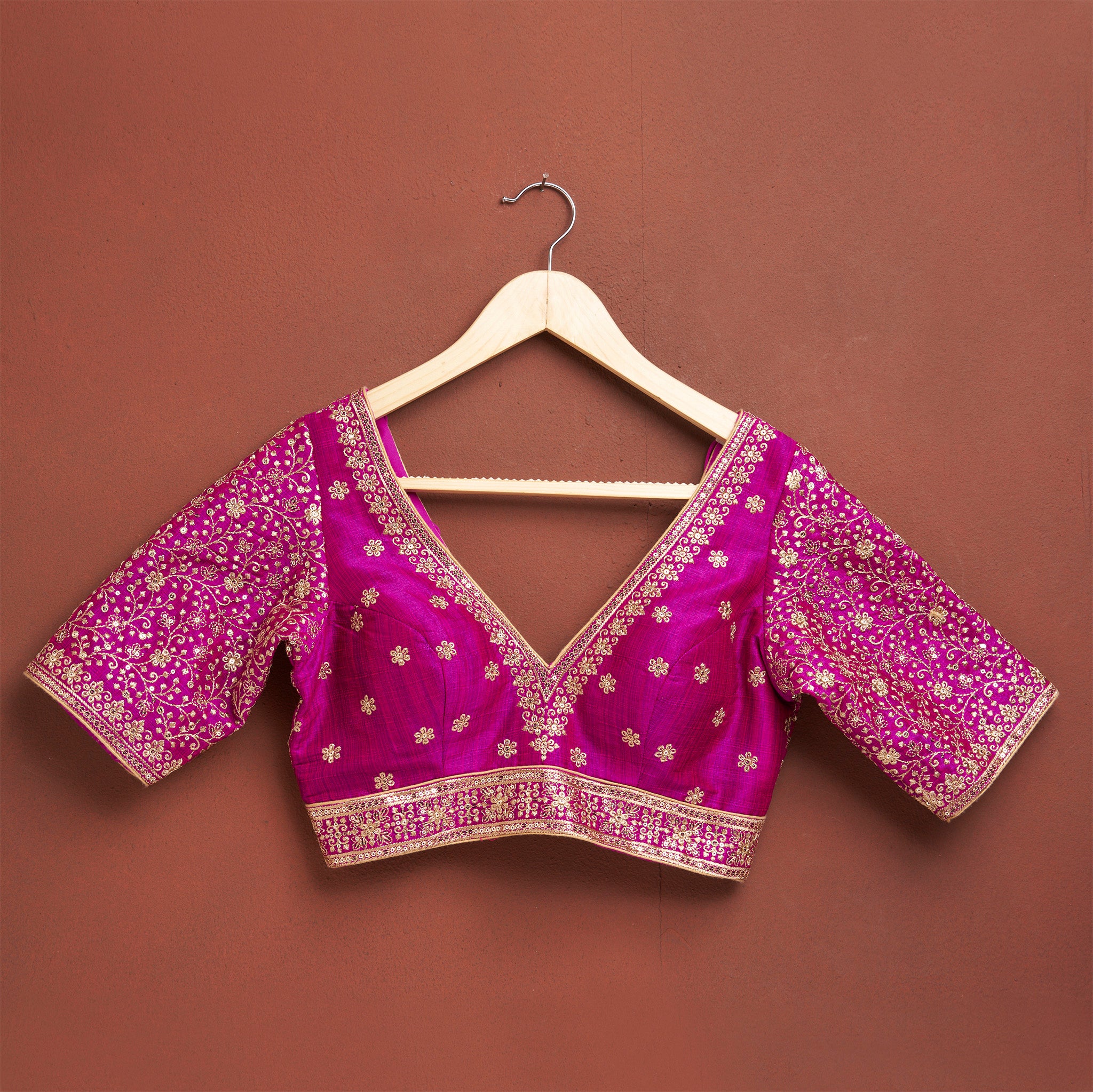 Purple embroidered silk plunging blouse